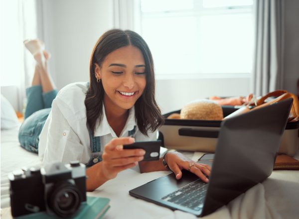 ShieldSafe young girl looking at credit card